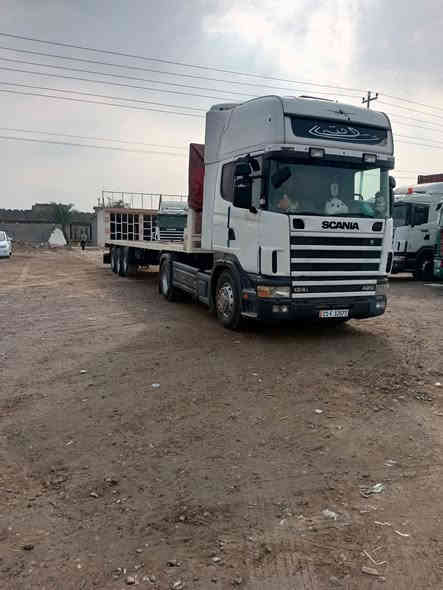 اسكانيا موديل 2003كير كوبره  انجكتر 420 سياره كفاله عامه رقم سليمانيه دولي بسمي تحويل ثاني يوم للبيع راس مع العربانه *********** مكان السياره واسط الصويره
