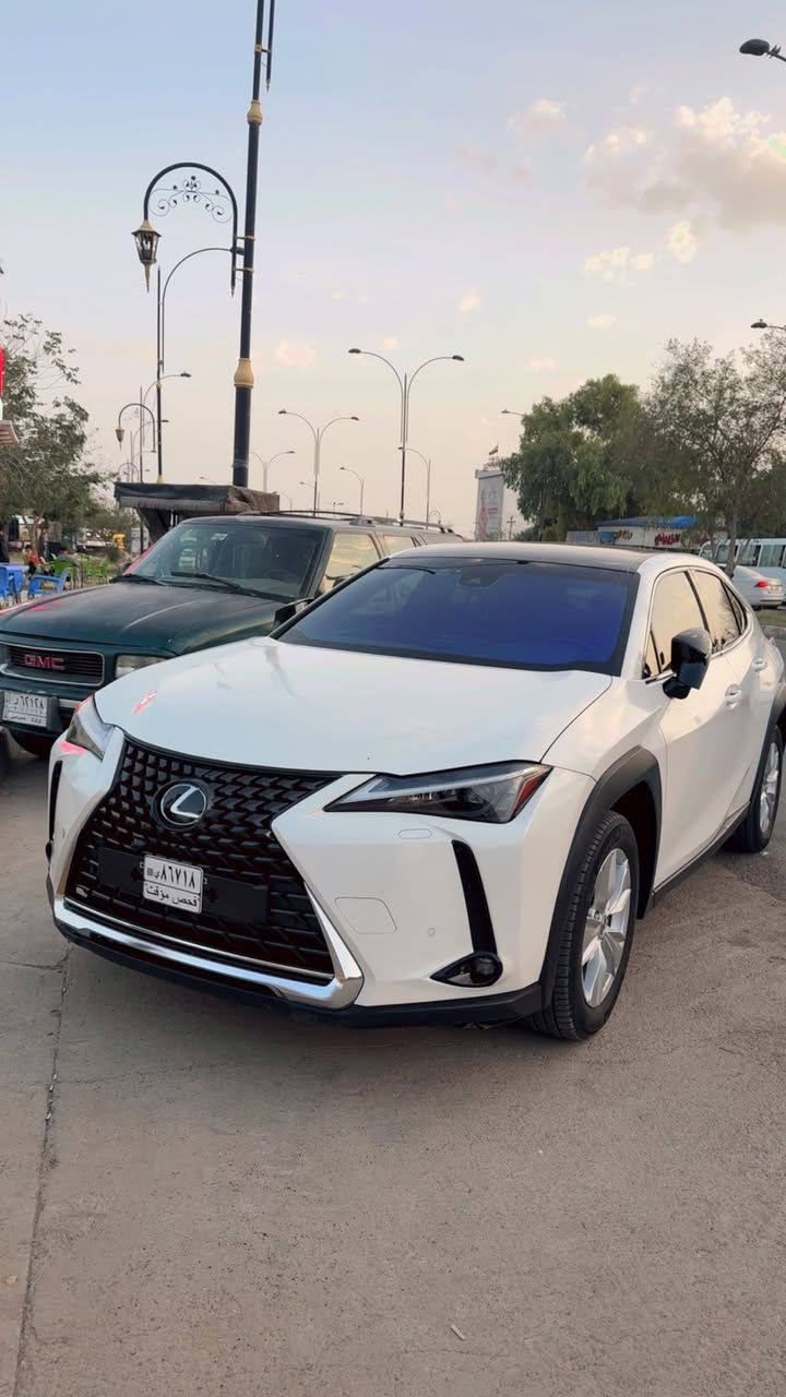LEXUS UX250h 2023 🤍 
� السيارة موجودة بـ كركوك
📞*********** 
 السيارة مفحوصة وموجوده الضرر مالتها كامل بالتقرير 
ملاحضة الاباب رش لتوحيد اللون 
وسيارة رقم كركوم ومرقمة باسمي

