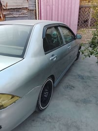 للبيع لانسر 2005 محرك 2000 كير اوتوماتيك  مصبوغة حزام   مكاني بغداد ال...