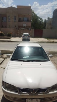 بروتون ٢٠٠٢ • رقم نينوى • دولي