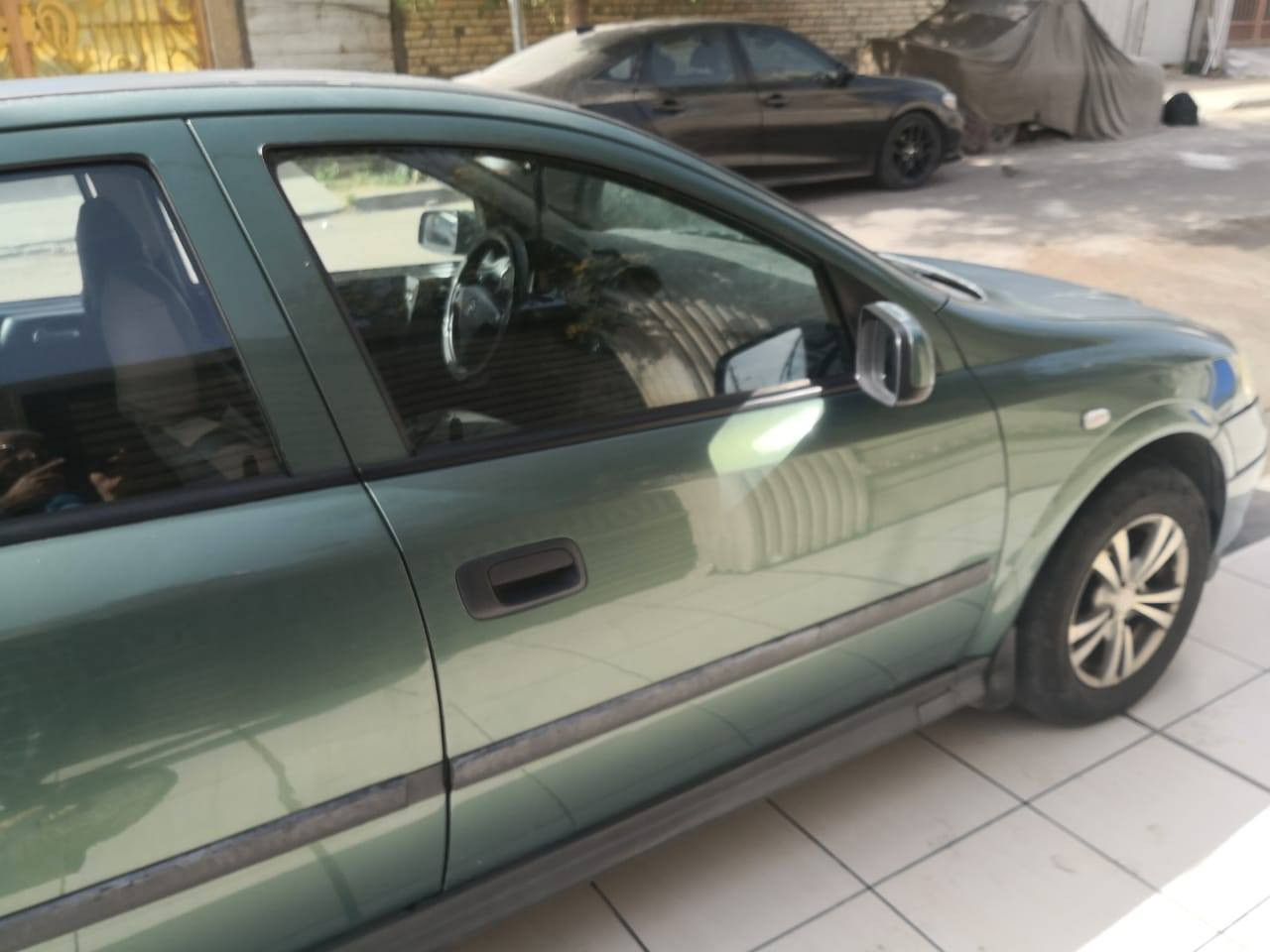 سلام عليكم اوبل استرا موديل 2002 سياره بلاديه مكفوله من ضربه  كير عادي رقم بغداد عنوان سياره بغداد عطيفيه سعر 52 رقم هاتف ***********
