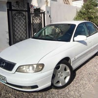 اوبل اوميكا 2002 (بزون) بدون صبغ كير أوتوماتيك تبريد ثلج، مكينة 4 سلند...