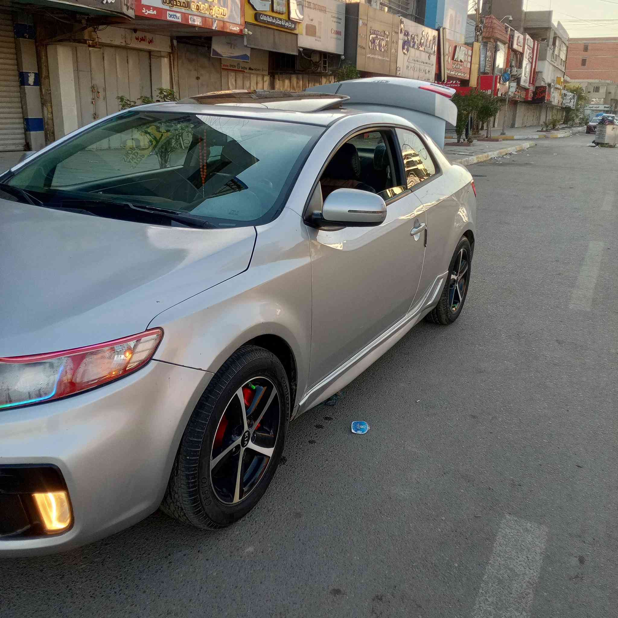 السلام عليكم كيا فورتي كوبية تك باب 2013 سياره شبابيه وحلوه سياره بسمي رقم بغداد انكليزي فول مواصفات عد بصمه كشنات جلد تدفئه تحكم ستيرن جهتين شاشه كاميرا سياره محركه 2400 كير عادي سبع نمر تبريد شغال تدفئه   كهربائيات كلها شغاله لايتات ال اي دي بكليتات ليد سياره بدون ايرباك تلاث قطع صبغ مكاني بغداد كراده هذا رقمي استفسار***********
