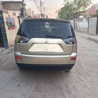 للبيع ميستوبوشي اوتلاندر ياباني موديل 2009باسمي رقم بغداد تحويل ثاني ي...
