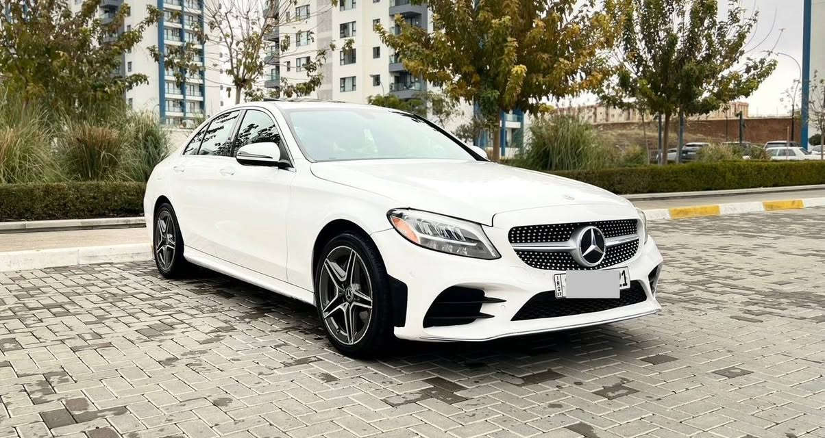 السعر مناسب جداً قياساً بالجدادة والنظافة استخدام شخصي
Mercedes Benz C300 AMG موديل 2020 
عداد المسافة: 50 ألف
رقم السيارة: أربيل تحويل بشرط

ال💎ــسعـر 🟥 :: رقم (1) تلـقـائـي 📮

مواصفات وتفاصيل السيارة:
فتحة سقف (سلايد روف)
المحرك: 2.0 لتر توربو – 4 سلندر
ناقل حركة 9 نمر
شاشة معلومات وسطية بحجم كبير

تحكمات كاملة على الستيرن
نظام ملاحة (Navigation) + CarPlay
حساسات أمامية وخلفية + كاميرا خلفية
مقاعد جلد أسود ودشبول مطعم بالصاج

نظام تثبيت سرعة مع رادارات أمامية 
وخلفية وجوانب تشغيل بصمة 
مع نظام دخول ذكي لجميع الأبواب

تدفئة ستيرن + أنارة محيطية (64 لون)
بصمة أبواب مع بصمة فتح وغلق الجنطة
كشنات أمامية تدفئة مع نظام خزن (ميموري)

كشنات أمامية كهربائية
صندوق كهرباء + 5 أنظمة قيادة
لايتات ليد (8 عدسات) + بك لايت ليد

شحن وايرلس (Auto)
سستم سماعات Burmester
نظام Auto Stop + Auto Hold
هيكل AMG بلادي شركة

ويل كب حجم 18 مع تخم تايرات دنلوب لوك
عدة الإسعافات، الهوك، الجنطة، 
واللوحة موجودات

السيارة حادثة حادث سطحي: 
جاملغ أمامي أيمن ربعه مبدل ومبخوخ، 
مع جاملغ خلفي أيمن وشوية من الباب الخلفي 
مسوي مباوك فقط، بدون تعديل بارد، 
بدون شخوط، وبدون أي إيرباك 

(كلها سليمة على وضع شركة)
السيارة مسويلها بوليش وتشميع

السيارة بدون أي خلل، كير ومحرك وحدادية بشرط والكهربائيات شغالة، ومسويلها سيرفس دهن وفلاتر ومي راديتر (أنتي فريز) وبدون أي نقص 
موقع السيارة بغداد حاليا

رقم صاحب ســـيـارة :: ***********
