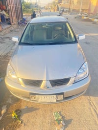 لانسر ٢٠١٠ • بدون ضربه • بدون معجون