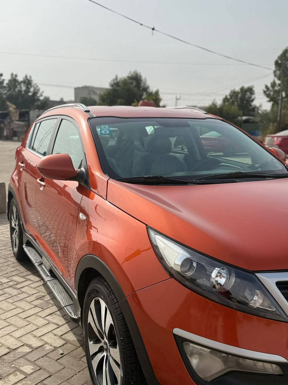 سلام عليكم سبورتج ٢٠١٤ خليجيه 
مكفوله كفاله عامه من الصبغ ولبارد وتبديل 
نص مواصفات 
تحكم ستيرن 
ثلاجه 
حساس خلفي 
كامره 
اوكس 
بلوتوث 
جلد 
تخم تاير 
مكينه كير 
مكفوله من الفتح 
صدر جديد 
سعر 150 وبيه مجال 
رقم بغداد جديد
*********** وتساب
