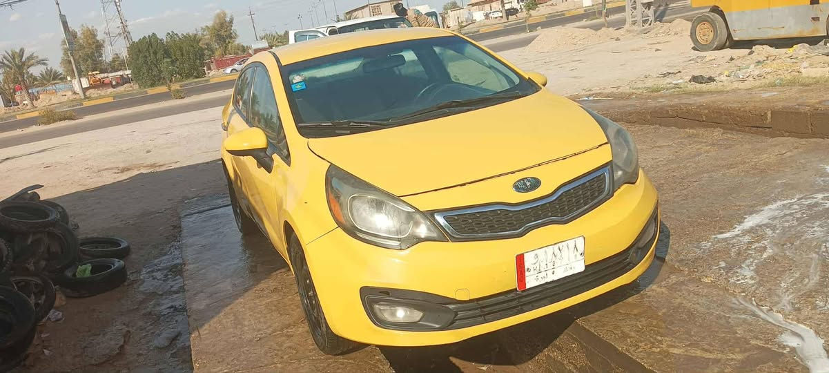 كيا ريو رقم بغداد دولي وارد امريكي محرك 1600  سعر ٨٠
