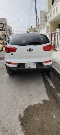 عندي سبورتج موديل 2015 امريكي كلين بدون صبغ لون ابيض بدون ايرباك حجم ا...