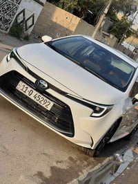 تويوتا كورلا هايبرد للبيع 2024 ماشية 22 الف  بصمه تشغيل +بصمه ابواب  ك...