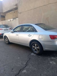 سوناتا ٢٠٠٩ وارد امريكي ضررها جاملغ خلفي فقط قطعه وحده  عداها كفاله تخ...