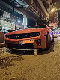 السلام علیکم  ✅شوفر كمارو 2LT  ✅الموديل 2012  ✅اللون برتقالي مصفر (لون...