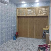 النجف حي الجزيرة • ١٠٠م • طابق واحد جديد