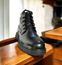 بوت جلد أصلي • كعب طبي • قابل تعديل