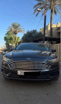 فورد فيوجن للبيع كلين تاتيل فقط ضربه ببغداد بالباب الخلفي عكس السايق  ...