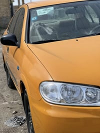 نيسان سني ٢٠١١ محرك قبغ ابيض السياره مصبوغه عام مكفوله من الكصه والضرب...