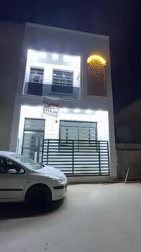 يوجد حاليافي بغدادالجديده خلف المصرف شارع عريض مشتمل للبيع جديد بناء ٢...