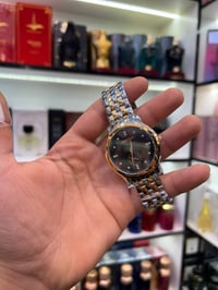 ماكنه سويسري • اصلي • ساعة