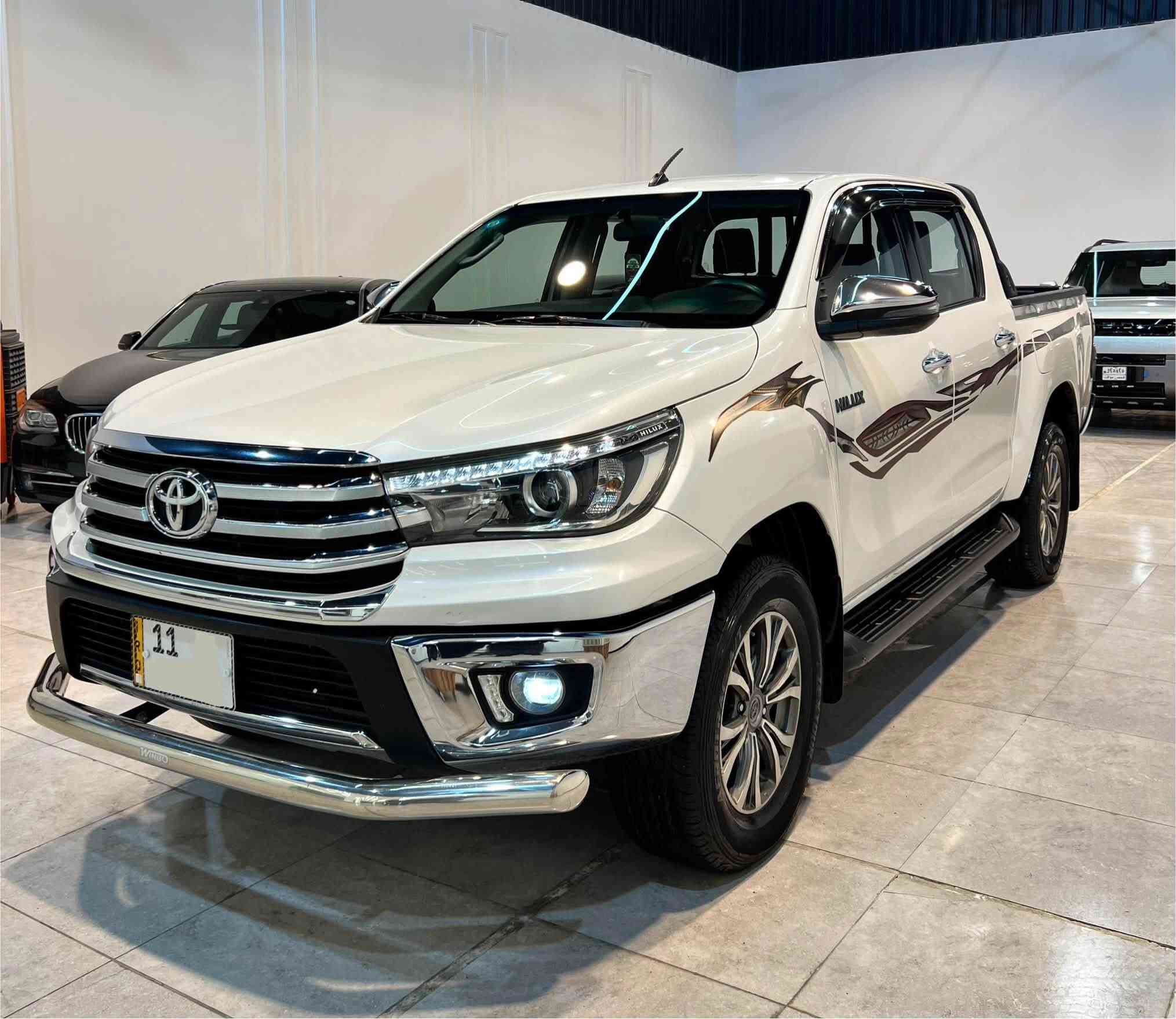 | تويوتا هايلوكس 2020 4×4 بصمة
مكفولة من الصبغ والتبديل والفتح كير محرك كفالة
💥 قوية.. عملية.. وجاهزة لكل الطرق 💥

السعر 267 ورقة وبي مجال 

✅ الموديل: 2020
✅ نظام الدفع: رباعي (4×4)
✅ المحرك: 2.7 لتر – 4 سلندر
✅ ناقل الحركة: أوتوماتيك 6 سرعات
✅ عدد المقاعد: 5

المواصفات:
✨ شاشة 8 إنش
✨ Apple CarPlay & Android Auto
✨ كاميرا خلفية
✨ حساسات أمامية وخلفية
✨ مصابيح LED
✨ مثبت سرعة
✨ نظام الثبات الإلكتروني (VSC)
✨ مساعد صعود المرتفعات (HAC)
✨ نظام ABS
✨ وسائد هوائية
✨ جنوط 17 إنش
✨ خزان وقود 80 لتر

متوفرة لدى معرض احمد الكبيسي لتجارة السيارات 

📍عنوان بغداد• حي جامعة • نفق الشرطة 

📞 للاستفسار والاتصال:
***********
***********
