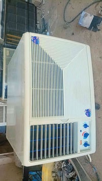 مكيف ٢ طن • كمبريسر أمريكي • تدفئة وتبريد