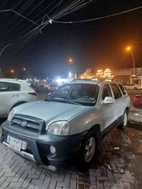 سنتافي 2004 شكل قديم كير مكينة مكفولة  تبريد وسلايد روف وكهربائيات كله...