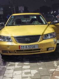 سيارة ازيرا موديل ٢٠٠٨ مصفره هيئة وغرامات رقم بغداد انكليزي تحويل مباش...