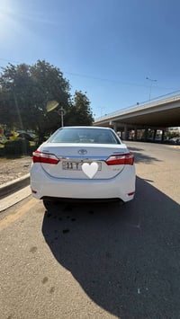 كورلا ٢٠١٥ • ماشيه ٦٥٠٠٠ • رقم بغداد