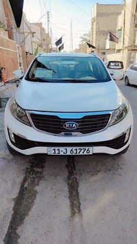 سبورتج ٢٠١٢ للبيع خليجي رقم بغداد انكليزي سياره نظيفه كله جاهزه بيه فق...