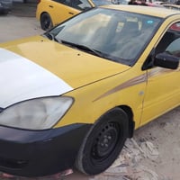 لانسر • ٢٠١٠ • مكينه وكير مكفوله