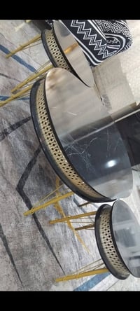 طبلات وسطية • واحدة كبيرة • اثنين صغار