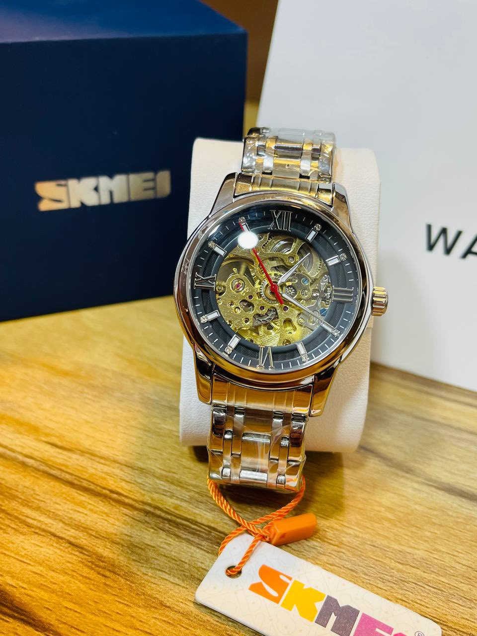 ساعة SKMEI ( سكمي ) ⚜️
- اوتماتيك نبض ، تكويك 
- مينا إطار اسود ، تصميم الهيكل العظمي ذهبي يظهر عمل المكينة 
- لامينوس اميال و إشارة مع اضافة لمسه الاحجار الاكرستال
- مكينة ياباني ماستر 
- هيكل و سير ستانلس ستيل مقاوم للصدأ 
- مقاومة للماء 
- زجاج زفير ضد الخدش 
- وزن ثقيل

السعر : 50 ألف مع التوصيل 🚚
مع ضمان سنة ✅


**إذا كنت صاحب هذا الإعلان وتريد حذفه لأي سبب، رجاءا أرسل رسالة إلى الدعم الفني**