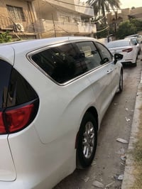 كرايسلر فويجر  بغداد2024 فول مواصفات شاشه كبيره حساسات خلفية كامره راد...