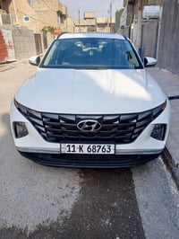 توسان مديل 24 رقم بغداد وارد امريكي  حادث موضح بالصور تبديل الجنطه نفس...