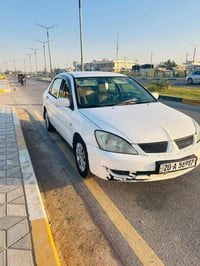 لانسر • ميتسوبيشي لانسر • لانسر 2010 • سيارة لانسر • ديالى • سيارة للب...