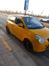 كيا بيكانتو موديل 2009 كير توماتيك محرك شرط هيئة مصفرة السيارة باسمي ك...