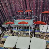 ميز زجاج • ٦ كراسي