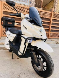 دراجه كهربائيه.. (TANK..GTR) بطاريه _ليثيوم 50 امبير مخرج شحن USP...عد...
