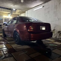 للبيع اوبترا موديل 2004كير عادي رقم بغداد الجديد بأسمي بيه صبغ جاملغات...