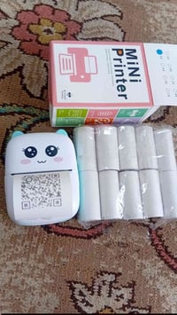 طابعة ملصقات • توصيل