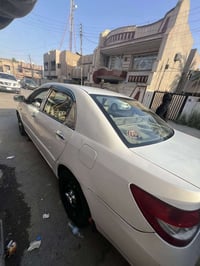BUD f3 2012 ابيض خصوصي كير ومكينه لانسر المرغوب 1600 السياره بيها منضو...
