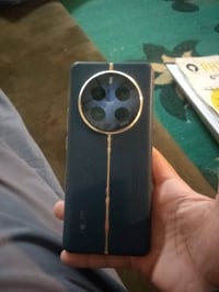 ريلمي 12 برو ذاكره 512  عشوائية 12+12  سعره 250 وبيه مجال بسيط  الرقم ...