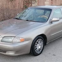 مازدا ٢٠٠٠ • قفل مركزي • كويسينجاك