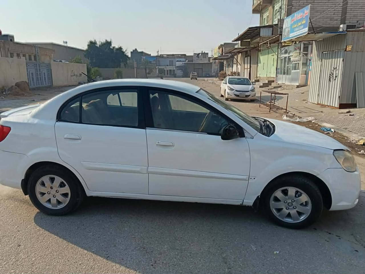 كيا ريو ٢٠١١ بيضاء اللون  رقم انكليزي بسم راعيهه مصبوغه حزام  امتجايه صوب السايق  ٦٥ وبيهه مجال  ***********  هذا رقم صاحب السياره مكلف بالنشر  غير متواجد على النت
