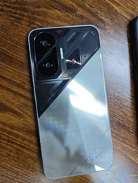 بوكو F7 اخو جديد ب395 ذاكرة 256 وعشوائية 12+12  معالج سناب دراكون 8 جي...