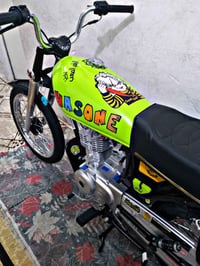 دراجة نارية • دهان أول • خدوش