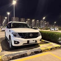 نيسان باترول SE2  2019  ابيض  رقم بغداد حرة بأسمي  مكفوله حتى الدعاميا...