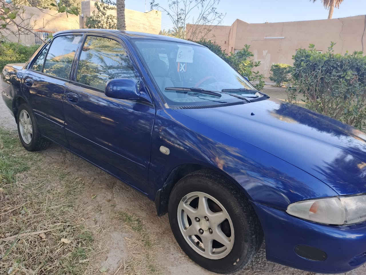 بروتون ٢٠٠٥ أوتو مصبوغه عام للجماليه بدون ضربه سنويه لل٢٩ كير شرط كصه جديد  مسجل شاشه كهربائيات كامله محرك ينقص قليل تبريد شغال بي كلج واكف فقط صدر وسط ٤٣ قفل بدون عمل  ***********  اتصال او واتساب
