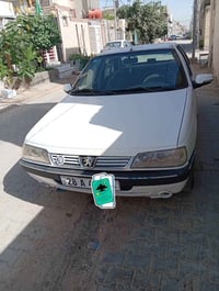 بيجو 405 • تحتاج تبريد • نجف38
