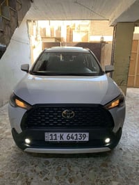 كورلا كروس 2024خليجي اللون:( ابيض صدفي ) السياره على وضع الزيرو  حجم ا...