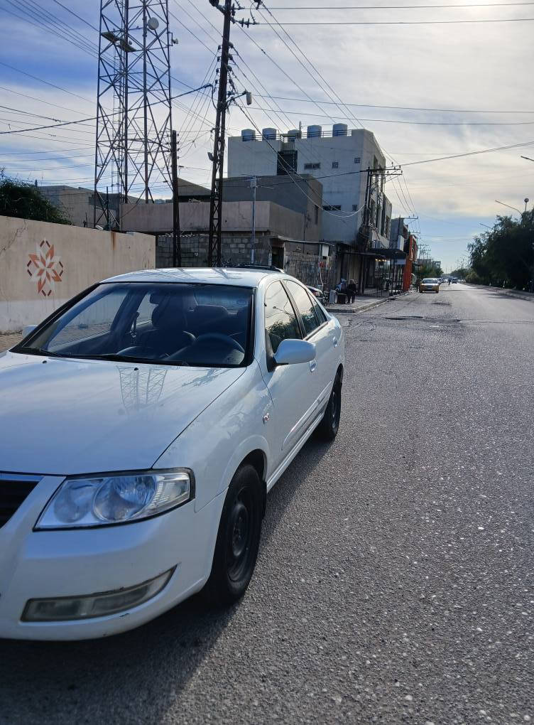 نیسان صنی کوری مودیل 2010 لون أبيض
 صدف داخل أسود كير ئوتوماتیك
بدون صبغ جاملغ كدام طرف سايق بارد
 4 جام كهربائية  بیلاجکتور 4 تايرات جديد 
رقم سلێمانية
سنوية جديد لحد 2030
بها بطاقة بنزين ماشية 225
محرك ابيض مرغوب
كير محرك بشرط
مکان سیارة کرکوك
سعر 105 مجال 
*********** كركوك, العراق
